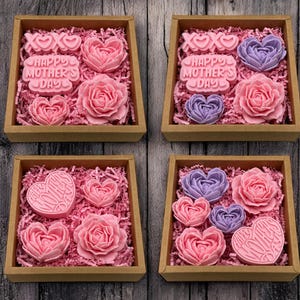 a box filled with pink and purple cupcakes
