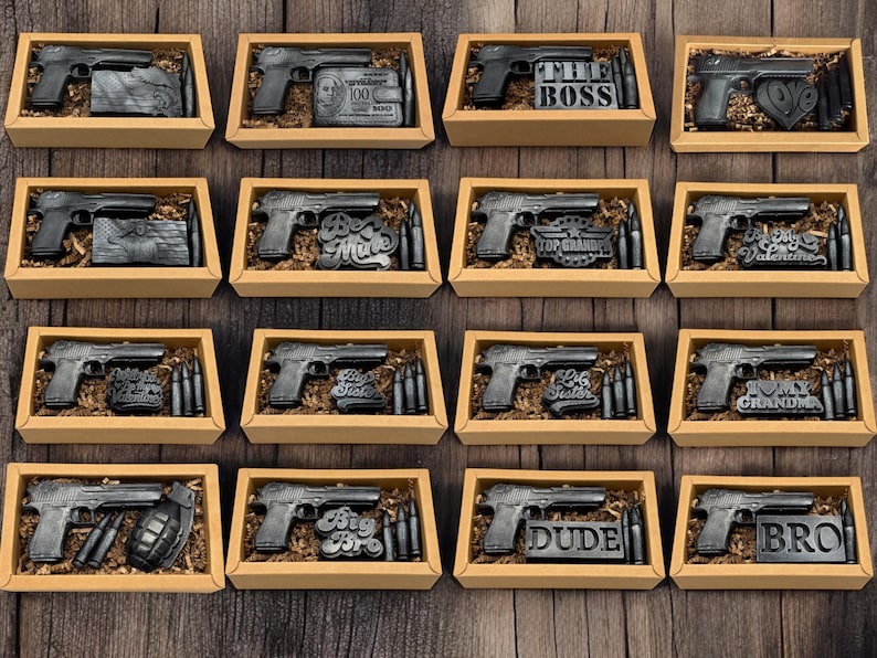 a bunch of guns in a box on a table