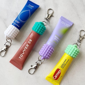 Bubble Lip Balm Keychain Cap: Travel Lip Gloss Holder and Badge Reel Accessories