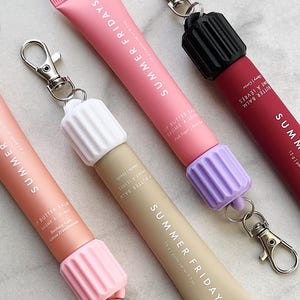 Fluted Lip Balm Keychain Cap: Travel Lip Gloss Holder and Badge Reel Accessories