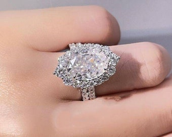 Set di anelli in moissanite ovale Art Déco, anello di fidanzamento Halo con fede nuziale per l'eternità completa, set di fedi nuziali da donna, anello in argento unico