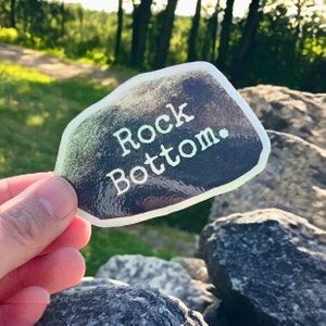 Rock Bottom vinyl sticker holografische afwerking | Woordspelingen | Citaatsticker
