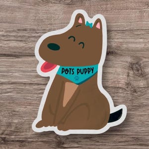 May include: A brown cartoon dog with a blue bandana that says "POTS PUPPY" and a pink bow on its head. The dog is sitting with its tongue sticking out.