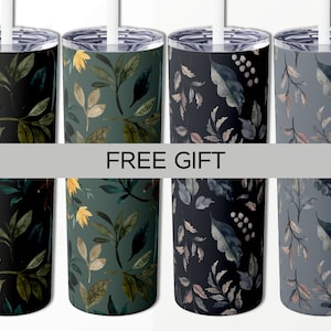 May include: Four stainless steel tumblers with different floral patterns. The tumblers are black, green, blue, and gray with watercolor-style floral designs.  FREE GIFT is printed on a gray banner.