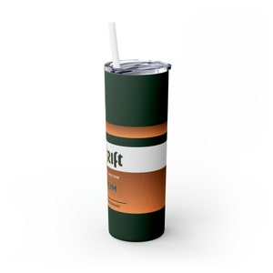 May include: A green and orange stainless steel tumbler with a white straw and the text "Drift" and "Since 1998" on the side. The tumbler is a tall, slender design.
