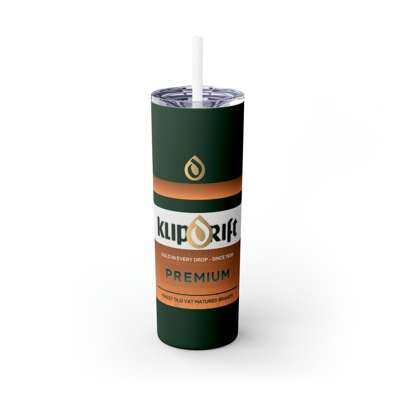 May include: A green and gold tumbler with the words "klipdrift" and "GOLD IN EVERY DROP - SINCE 1928" printed on it. The tumbler also says "PREMIUM FINEST OLD VAT MATURED BRANDY".