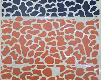 May include: A selection of patterned vinyl sheets in various colours. The top row features a light teal pattern, followed by a navy blue design, and two rows of orange patterns. The designs are abstract shapes.