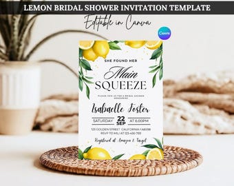 May include: Lemon themed bridal shower invitation template with the text "She found her Main Squeeze" and the bride's name "Isabaelle Foster". The invitation includes the date, time, and location of the shower. The design features watercolor lemons and greenery.