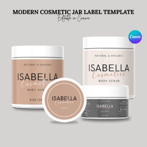 May include: A mockup of cosmetic jars and labels with the text "MODERN COSMETIC JAR LABEL TEMPLATE" and "Editable in Canva". The jars are white with labels in shades of brown and gray, featuring the brand name "ISABELLA Cosmetics" and product information.
