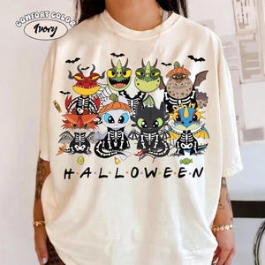 T-shirt squelette Halloween « Dragons » de Comfort Colors, T-shirt Epic Universe « Krokmou, Furie Éclair et ses amis », Universal Studios
