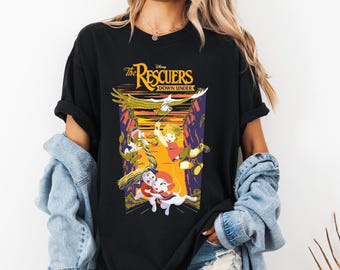 Camiseta de Disney "Los Rescatistas Down Under" con foto grupal al atardecer, camiseta de Bernard y Bianca de Los Rescatistas, regalo para unas vacaciones familiares en Disneyland