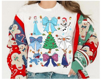 Camiseta navideña con lazo de Frozen de Disney, camiseta divertida de la princesa Anna Elsa y Olaf de Frozen de Disney, regalo para vacaciones familiares en Disneyland 2026