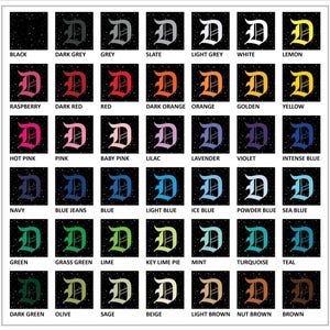 May include: A grid of color swatches, each featuring a capital letter "D" in a different color. Colors include black, grey, red, orange, yellow, pink, blue, green, brown, and more. Each swatch has a corresponding color name.