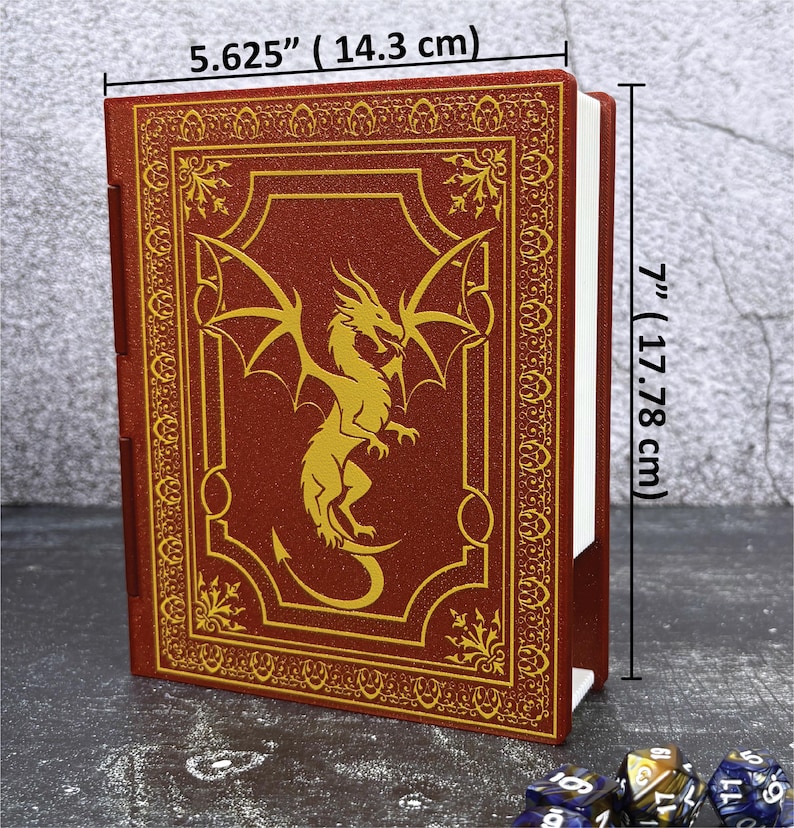 May include: A red, faux-leather book with a gold dragon design and decorative border. The book measures 5.625 inches (14.3 cm) wide and 7 inches (17.78 cm) tall. The book is likely for role-playing games.