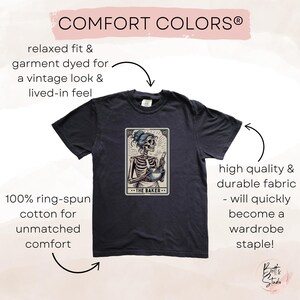 May include: A black t-shirt with a vintage look and feel. The shirt features a graphic of a skeleton holding a bowl and the text "THE BAKER". The shirt is made of 100% ring-spun cotton for unmatched comfort.