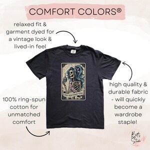 May include: Black t-shirt featuring a vintage-style illustration of a skeleton wearing a pink sash and holding a cupcake. The text on the illustration reads "The Birthday Girl". The shirt is made from 100% ring-spun cotton and has a relaxed fit.