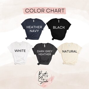 May include: Color chart showing six different t-shirt colors: Heather Navy, Black, White, Dark Grey Heather, Natural. The text "COLOR CHART" is at the top of the image.