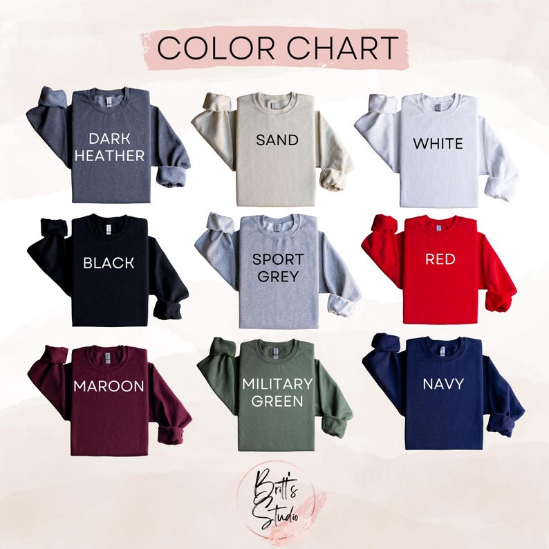 May include: A colour chart displaying nine crewneck sweatshirts in different shades: dark heather, sand, white, black, sport grey, red, maroon, military green, and navy. Each sweatshirt has its colour name in white text.