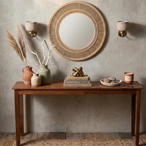 Rustic teak console table with reclaimed wood for entryway décor.