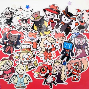 May include: A collection of colorful cartoon character stickers on a red background. The stickers feature various characters with unique designs, including characters with horns, hats, and bow ties. Some stickers have hearts and stars.