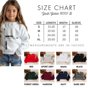 a little girl wearing a size chart sweatshirt
