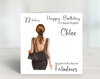 May include: A birthday card with a black and white illustration of a woman in a black dress and a black purse. The card says "Happy Birthday to a Special Daughter Chloe You don't look a day over Fabulous".