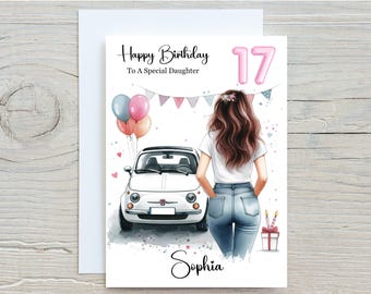 Puede incluir: Tarjeta de cumpleaños ilustrada con una chica, un coche blanco, globos y el número 17. El texto dice "Happy Birthday To A Special Daughter". El nombre "Sophia" está escrito en la parte inferior de la tarjeta.