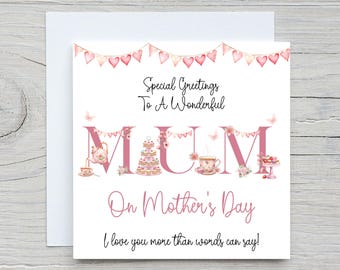 May include: A white Mother's Day card with a pink floral design. The word "MUM" is prominently displayed in pink, decorated with teacups, cakes, and flowers. The card includes the text "Special Greetings To A Wonderful Mum On Mother's Day."