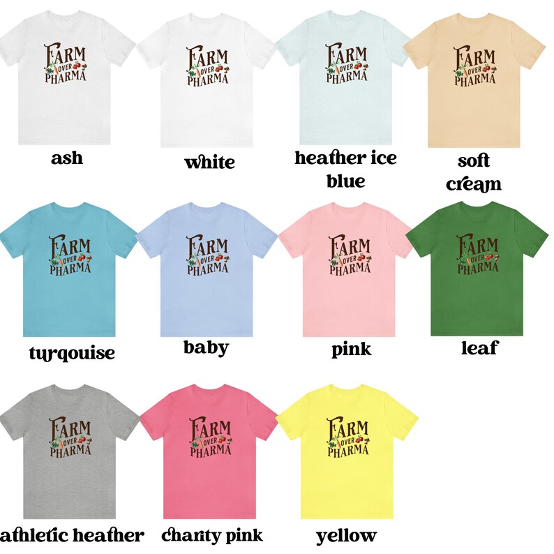 May include: A collage of 12 t-shirts in different colors, each featuring the text "FARM OVER PHARMA" in black with a small graphic of a farm scene. The t-shirts are displayed in rows of four, with the colors ash, white, heather ice blue, soft cream, turquoise, baby blue, pink, leaf, athletic heather, charity pink, and yellow.