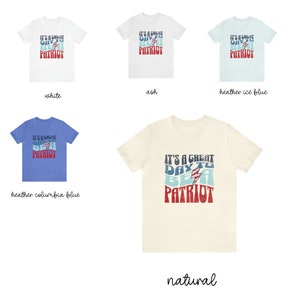 May include: A t-shirt featuring a vintage-style graphic that reads "It's a Great Day to Be a Patriot" in red, white, and blue. The shirt is available in five colours: white, ash, heather ice blue, heather columbia blue, and natural.