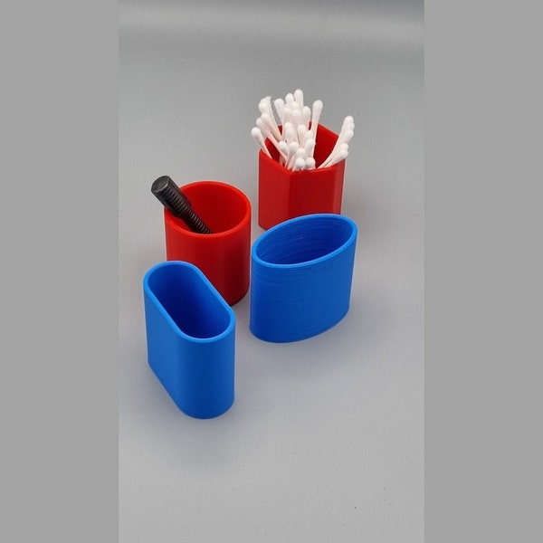 Cotton bud holders in different shapes and colors