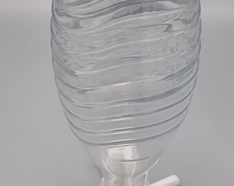 Support de bouteille pratique : Fini les chutes de bouteilles de Sodastream ou de biberons