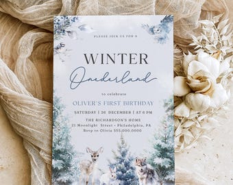 May include: A blue and white winter wonderland themed invitation for a first birthday party. The invitation features a deer, a wolf, and a rabbit in a snowy forest. The text on the invitation reads "Please join us for a Winter Onederland to celebrate Oliver's First Birthday Saturday | 26 December | at 6 PM The Richardson's Home 21 Moonlight Street - Philadelphia, PA Rsvp to Olivia 555,000.0000"