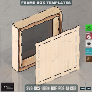 May include: A light-colored wooden frame box template with a partially open front, revealing a dark interior. The text "FRAME BOX TEMPLATES" is at the top. The design includes the text "SVG-XCS-LBRN-DXF-PDF-AI-CDR" and measurements of 3mm and 1/8in.