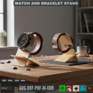 Peut inclure: Deux présentoirs en bois pour montres et bracelets. L'un d'eux supporte une montre noire avec un bracelet en cuir marron. L'autre présente un bracelet en bois marron. Les présentoirs sont sur une table en bois. Le texte sur l'image indique : WATCH AND BRACELET STAND.