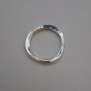 Organic styled silver band ring