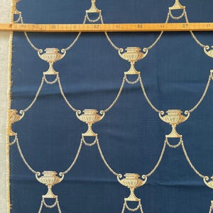 Upholstery fabric woven with Rococo motif