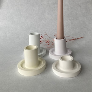 Candle holders in pastel shades / candle holders
