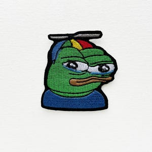 Puede incluir: Un juego de tres tazas de cerámica con un acabado mate moteado. Las tazas son de color crema, gris claro y gris oscuro. Cada taza tiene un diseño simple y minimalista, ideal para café o té.