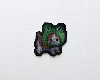 Kitten in Frog Hat Cross Stitch Patch: Whimsical Animal Accessory (2.56"x2.56")