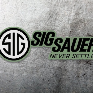May include: A sticker with the text "SIG SAUER NEVER SETTLE" in black lettering on a light green background. The logo includes a white emblem with the letters "SIG" inside a black circle.
