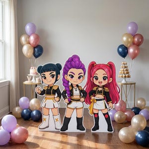 May include: Three standing cardboard cutouts of cartoon characters with large eyes, wearing black and gold cropped jackets and white skirts. The characters have distinct hairstyles in black, purple, and pink, surrounded by clusters of balloons.