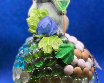 Frog (porcelain) Gazing Ball  sitting on Lilly pad silk w fish net on 9” marbled sphere.