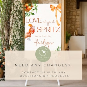 Puede incluir: Un letrero de bienvenida con el texto "LOVE at first SPRITZ" y "WELCOME TO Hailey's". El letrero presenta una ilustraci&oacute;n de acuarela de un c&oacute;ctel y detalles en naranja. La parte inferior del letrero dice "NEED ANY CHANGES? CONTACT US WITH ANY QUESTIONS OR REQUESTS".