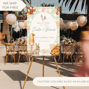 May include: An Easter Brunch sign on a wooden easel. The sign has an oval design with bunny ears, the words "Welcome to our Easter Brunch", and the date 04.24.20XX. The sign also features illustrations of a cocktail, a bunny, and a basket of bread.