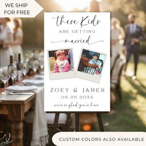 May include: A white wedding sign on an easel with the text "These Kids Are Getting Married." Two Polaroid-style photos are displayed. The sign also includes the names "Zoey & James" and the date "06.26.20XX."