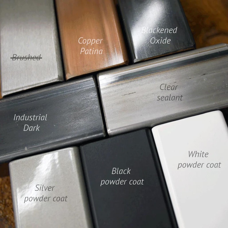 May include: Close-up of various metal finishes for a metal product.  The finishes include brushed, copper patina, blackened oxide, clear sealant, industrial dark, silver powder coat, black powder coat, and white powder coat.
