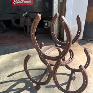 Horse shoe wine holder