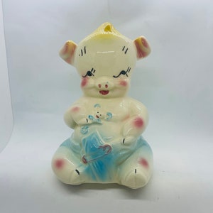 Tirelire Shawnee, porcelet avec couche et ours en peluche, années 40