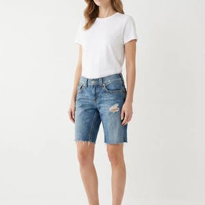 Distressed True Religion Jeans in Light Blue size W32 32